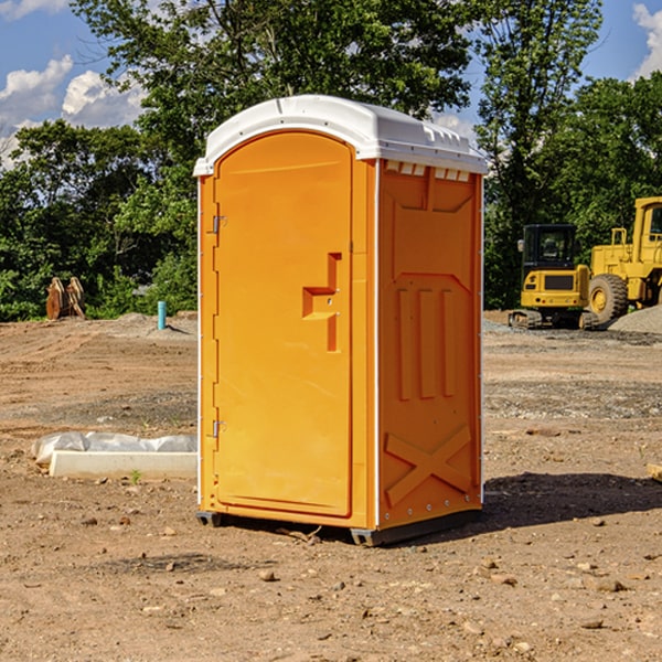 what is the cost difference between standard and deluxe portable restroom rentals in Halltown MO